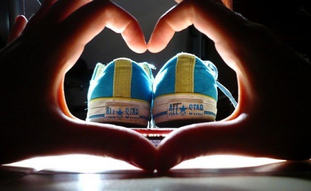 shoes and hand making heart